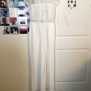 This an all into one white jumpsuit only worn once.
